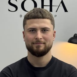 Николай